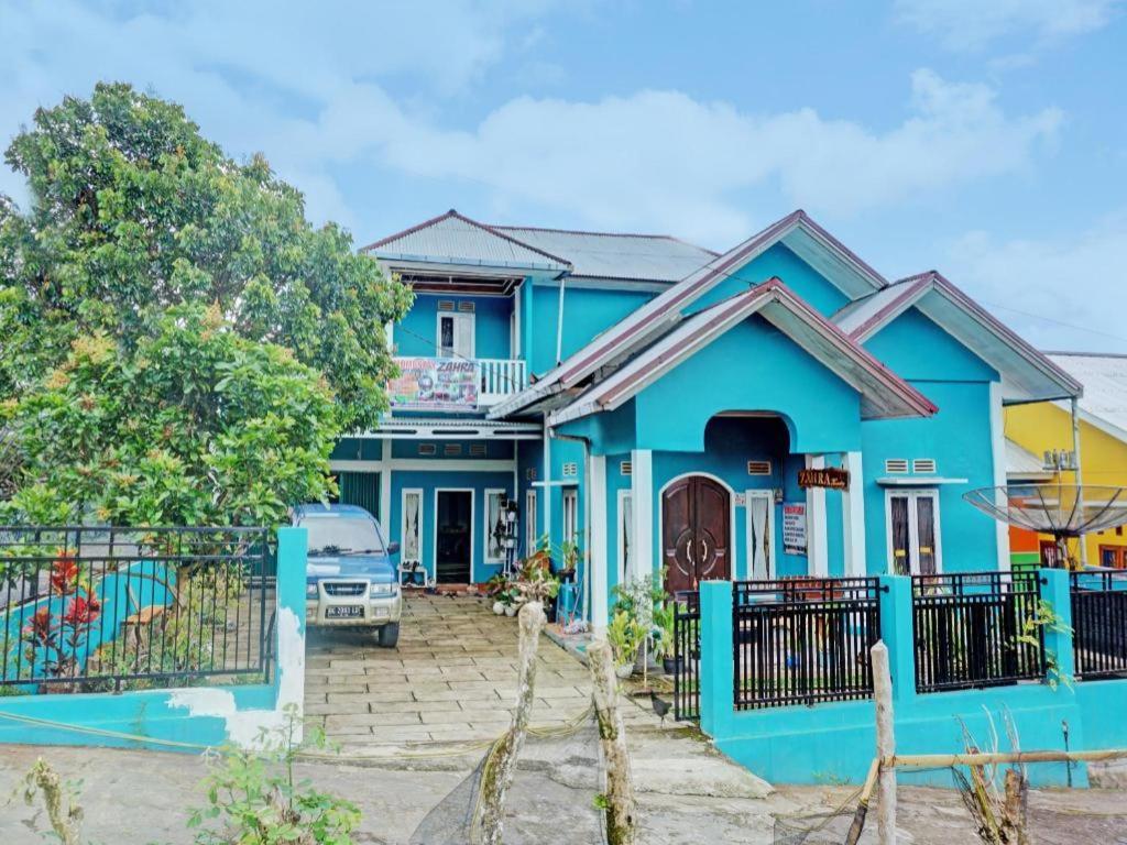 Homestay Zahra Syariah Gunung Dempo Mitra Reddoorz Lahat Exterior photo